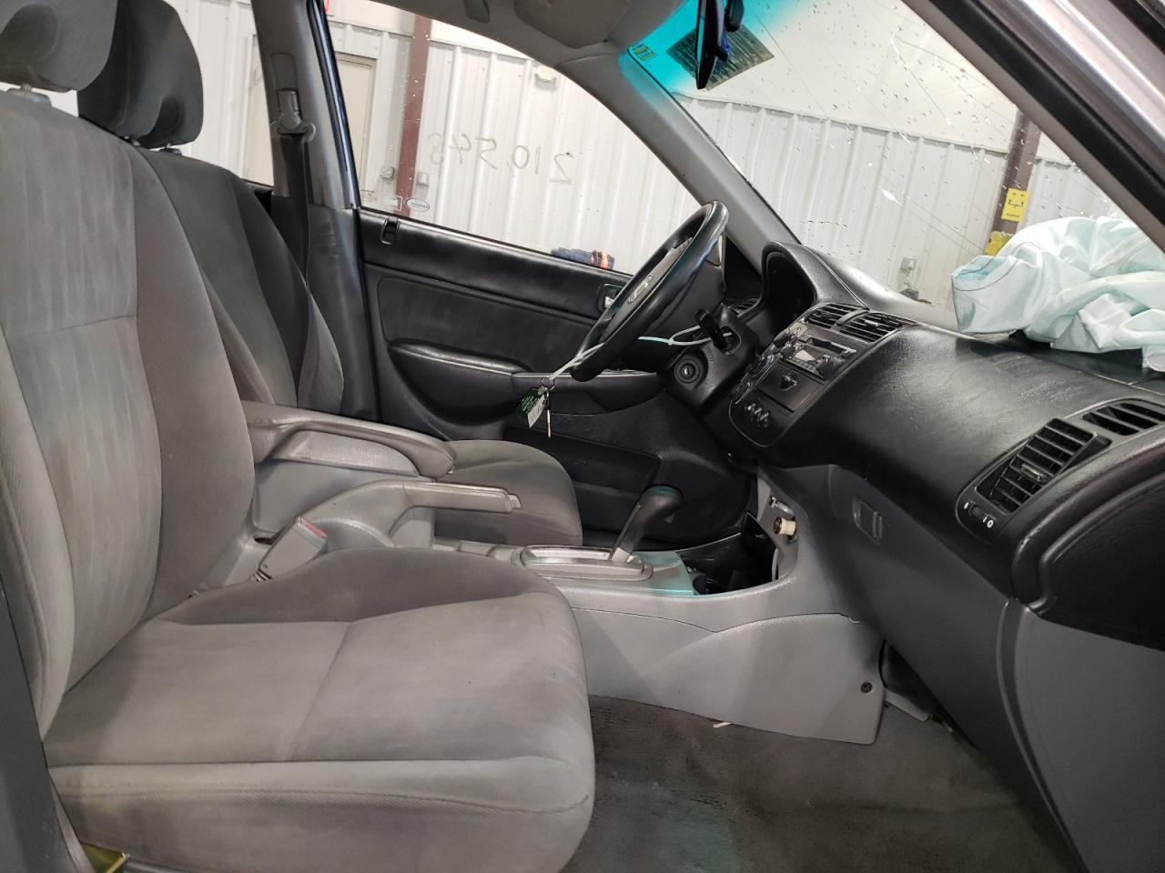 Photo 5 from auction – 2005 HONDA CIVIC LX with VIN 1HGES16585L014275