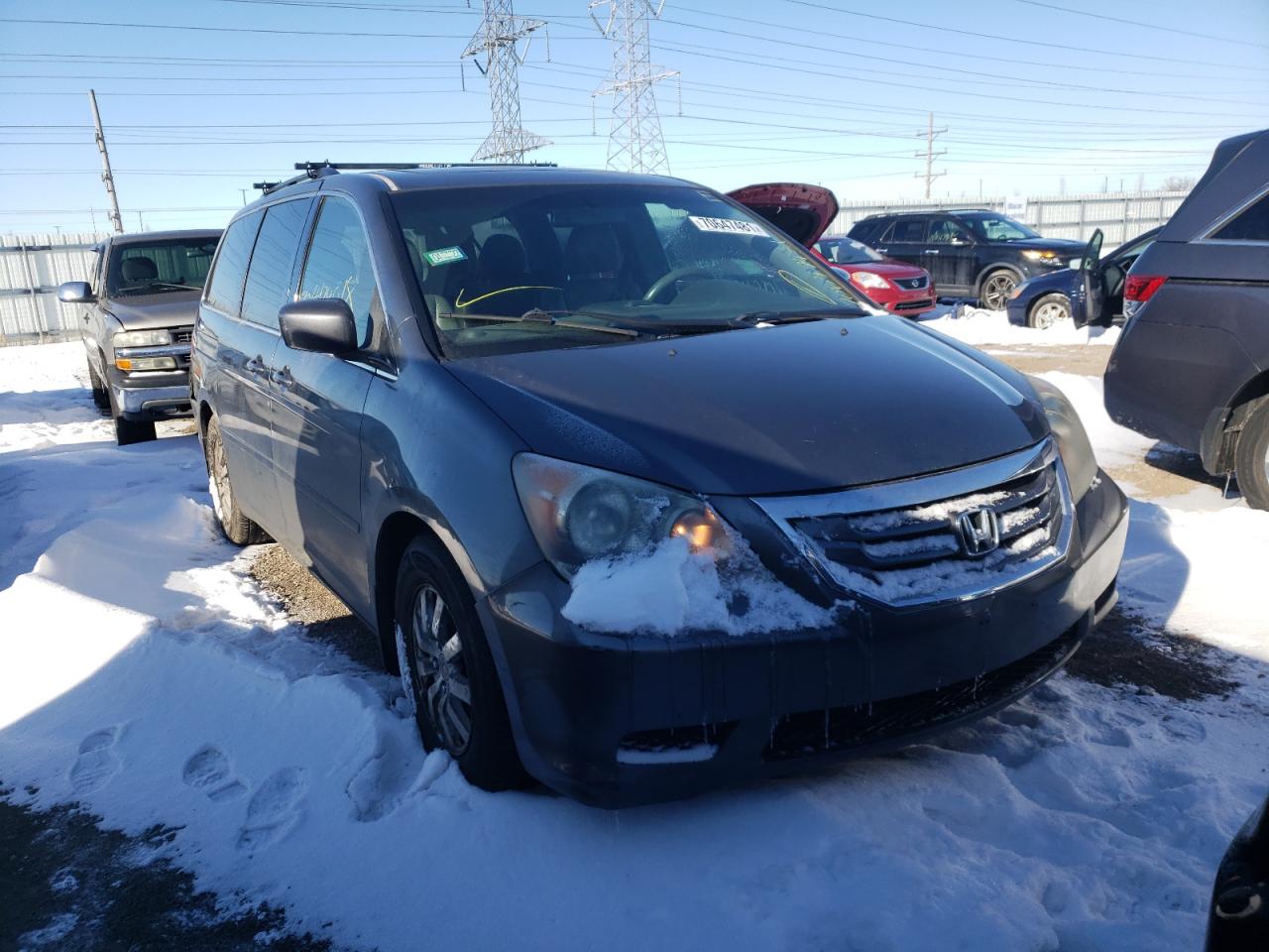 HONDA ODYSSEY EX 2010 with VIN 5FNRL3H74AB044717 - Photo from auction
