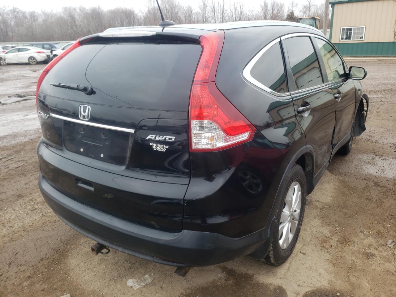 Photo 4 from auction – 2012 HONDA CR-V EXL with VIN JHLRM4H77CC010938