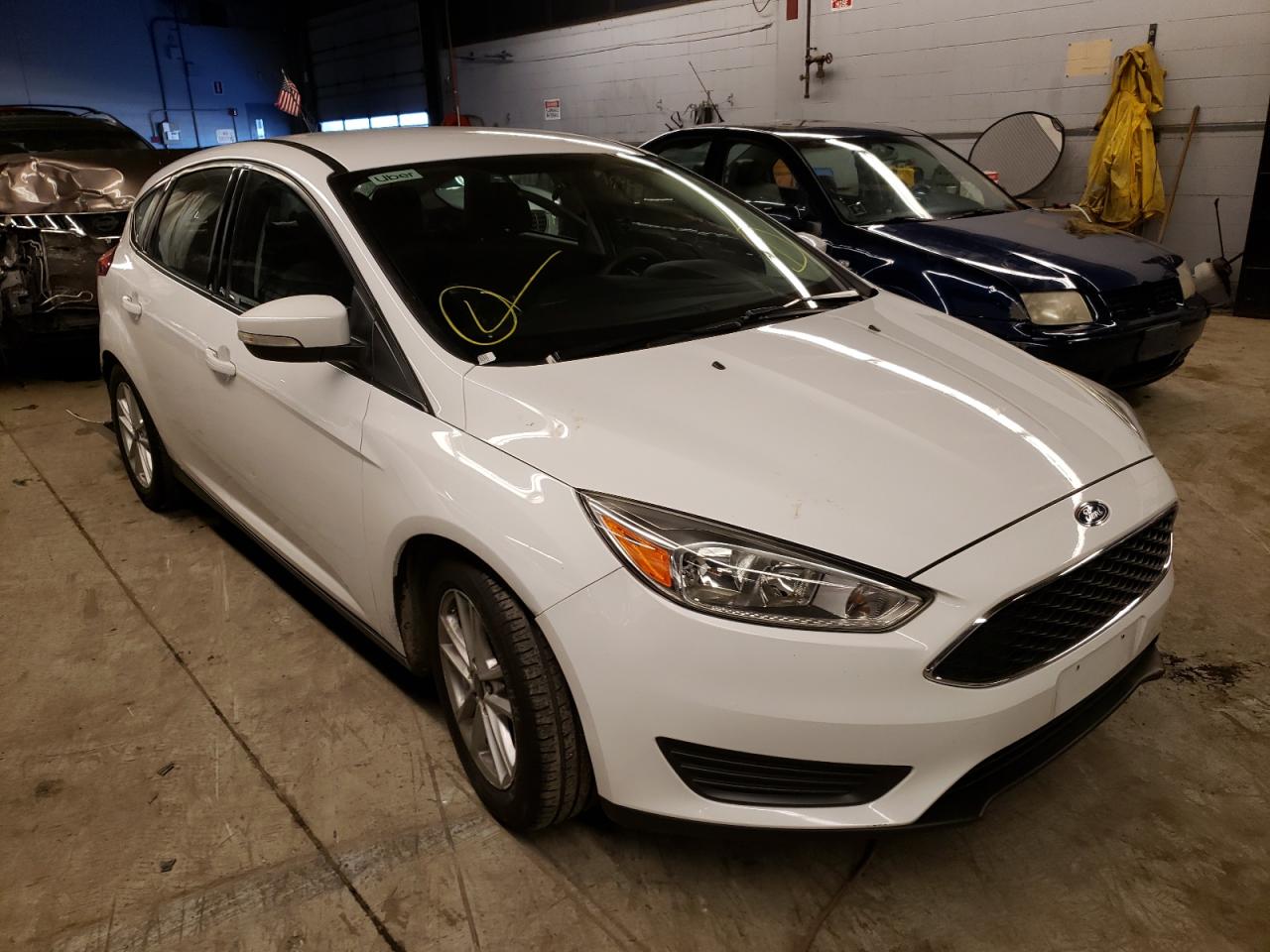 FORD FOCUS SE 2016 with VIN 1FADP3K22GL319931 - Photo from auction