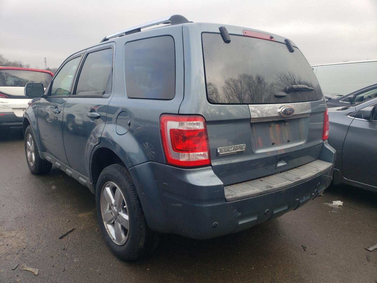 Photo 3 from auction – 2011 FORD ESCAPE LIM with VIN 1FMCU0E70BKA71810