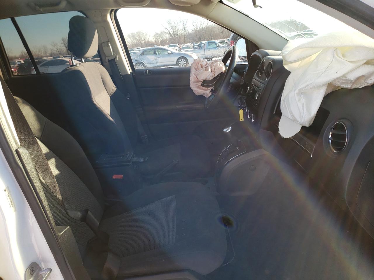 Photo 5 from auction – 2012 JEEP COMPASS LA with VIN 1C4NJDEB8CD698049