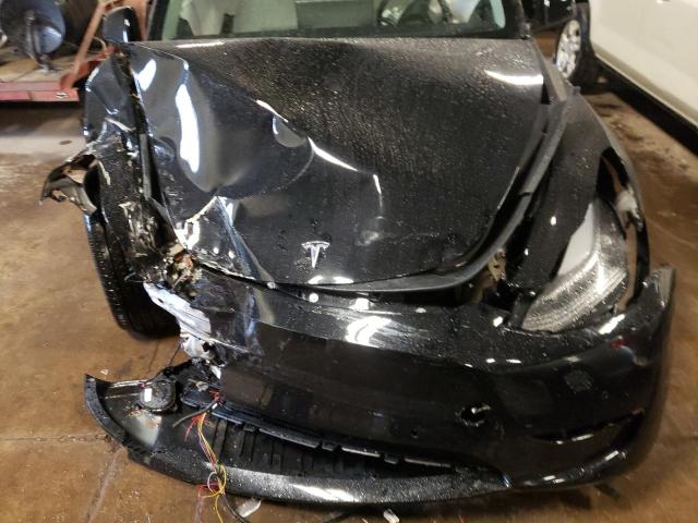 Photo 7 from auction – 2022 TESLA MODEL Y with VIN 7SAYGDEEXNF309111