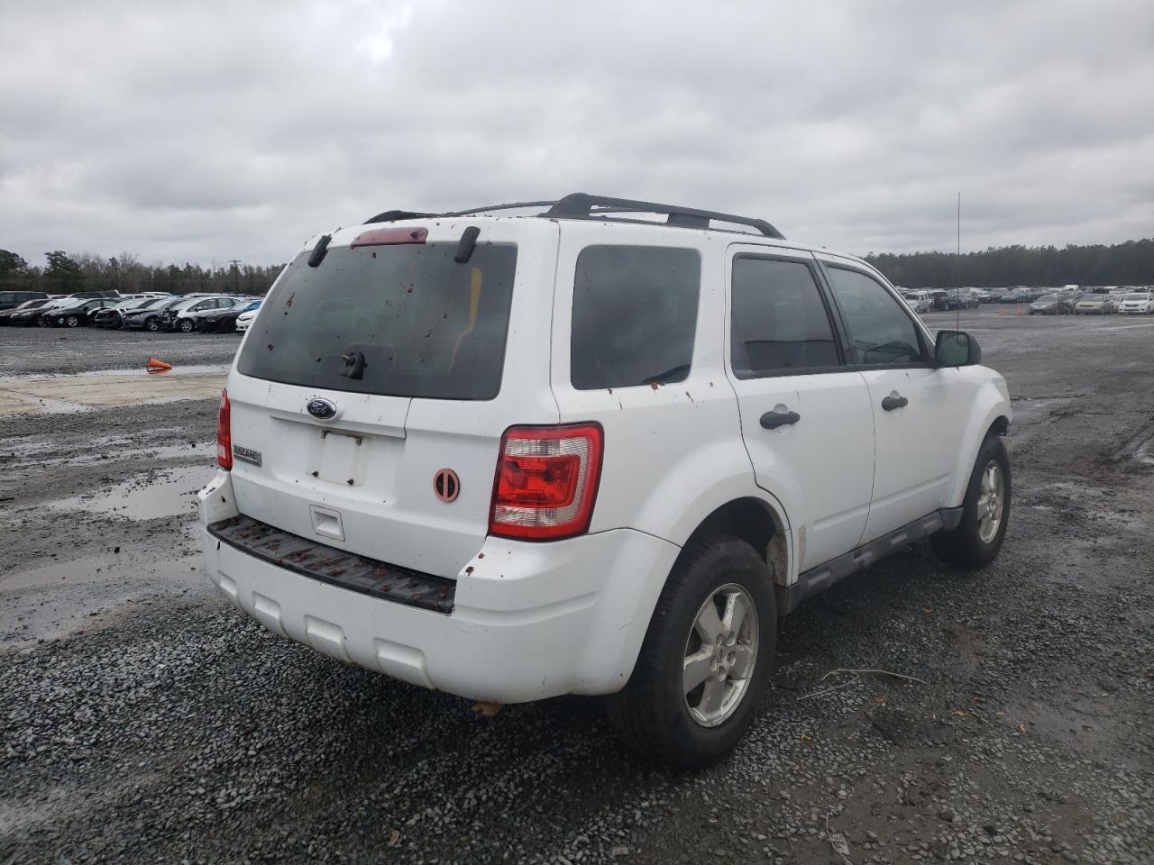 Zdjęcie 4 z aukcji – 2010 FORD ESCAPE XLS z VIN 1FMCU9C72AKD33414