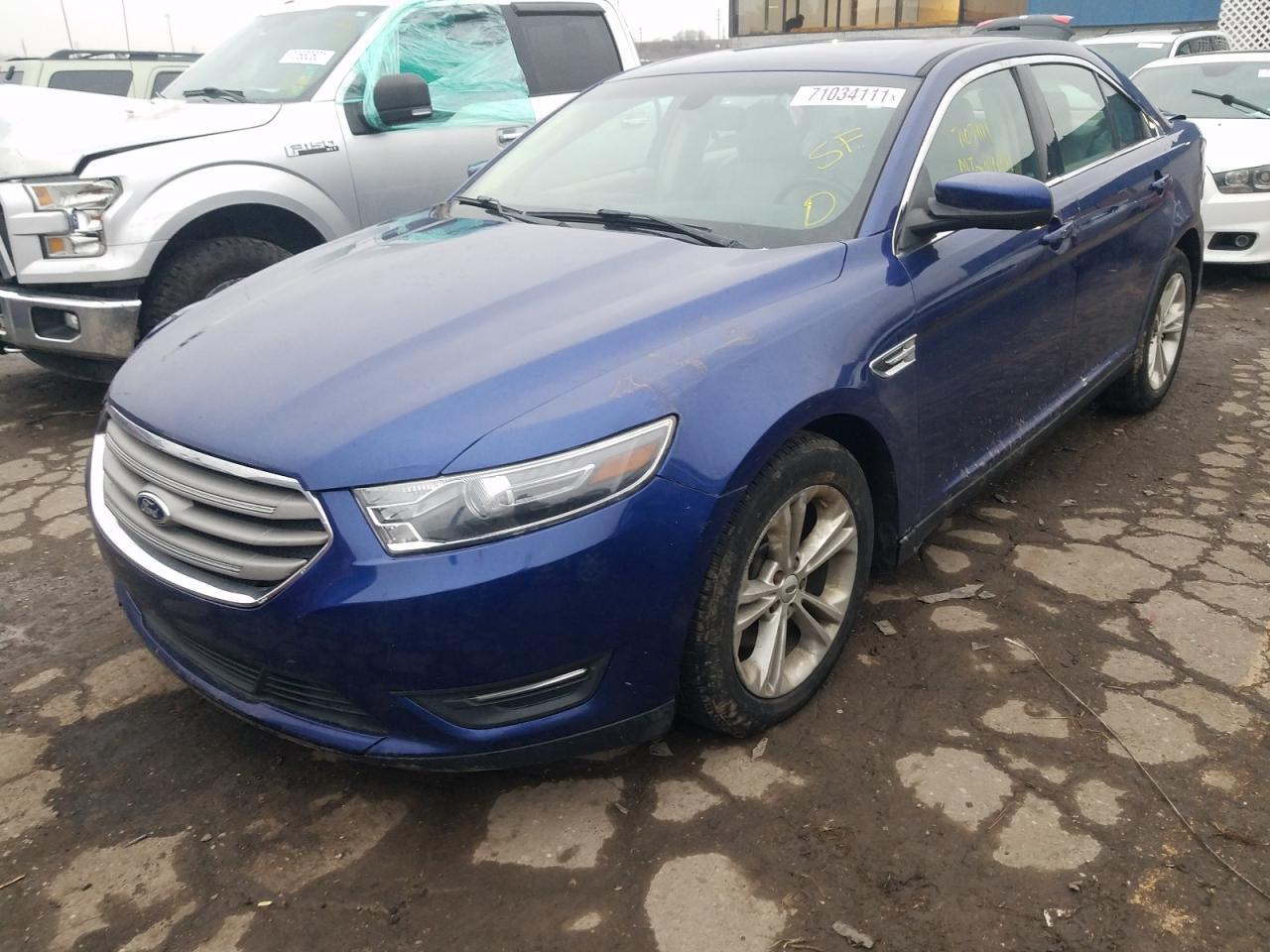 Photo 2 from auction – 2013 FORD TAURUS SEL with VIN 1FAHP2H84DG160163