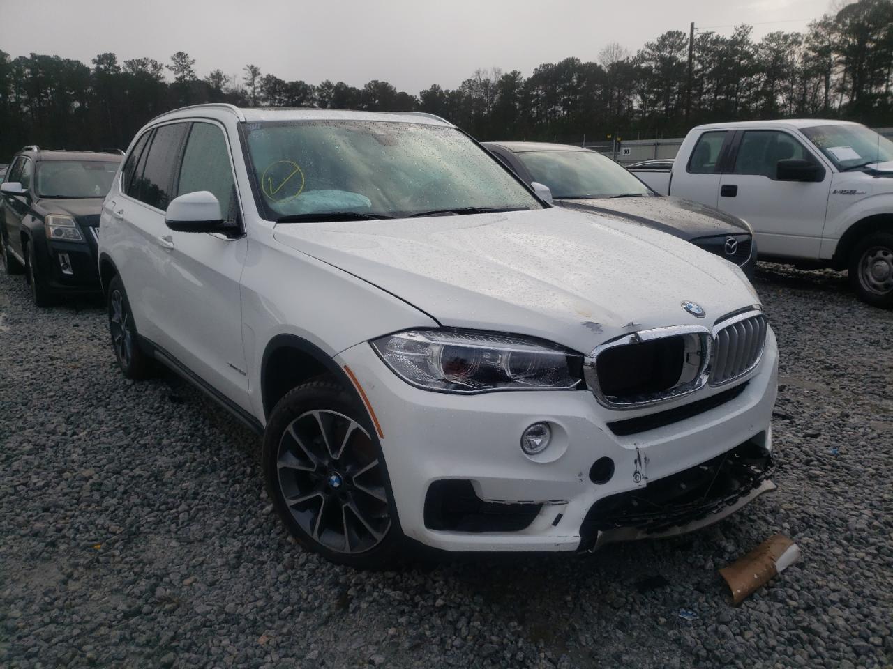 BMW UK 2017 with VIN 5UXKR2C30H0W43667 - Photo from auction