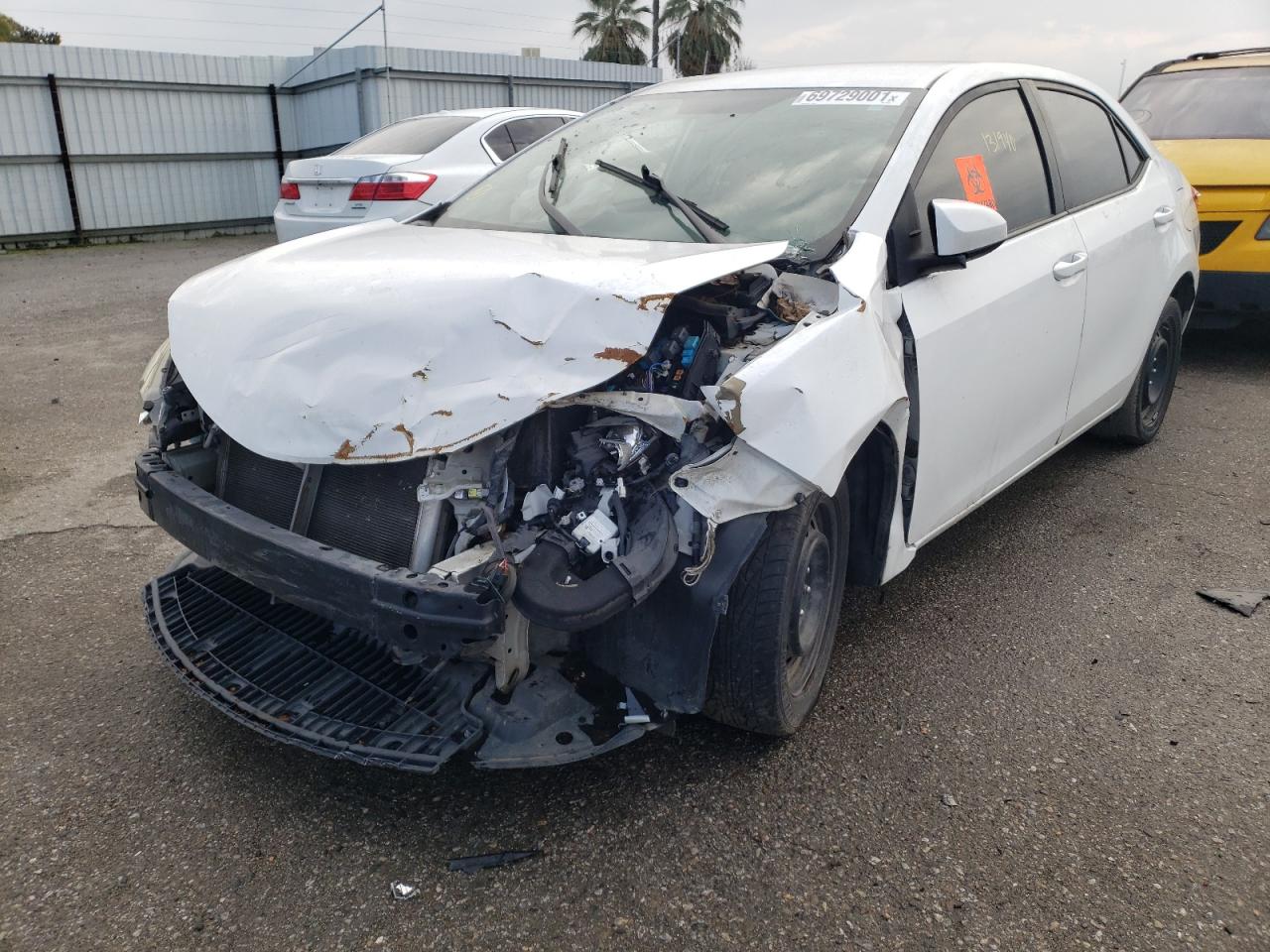 Photo 2 from auction – 2014 TOYOTA COROLLA L with VIN 5YFBURHE6EP141377