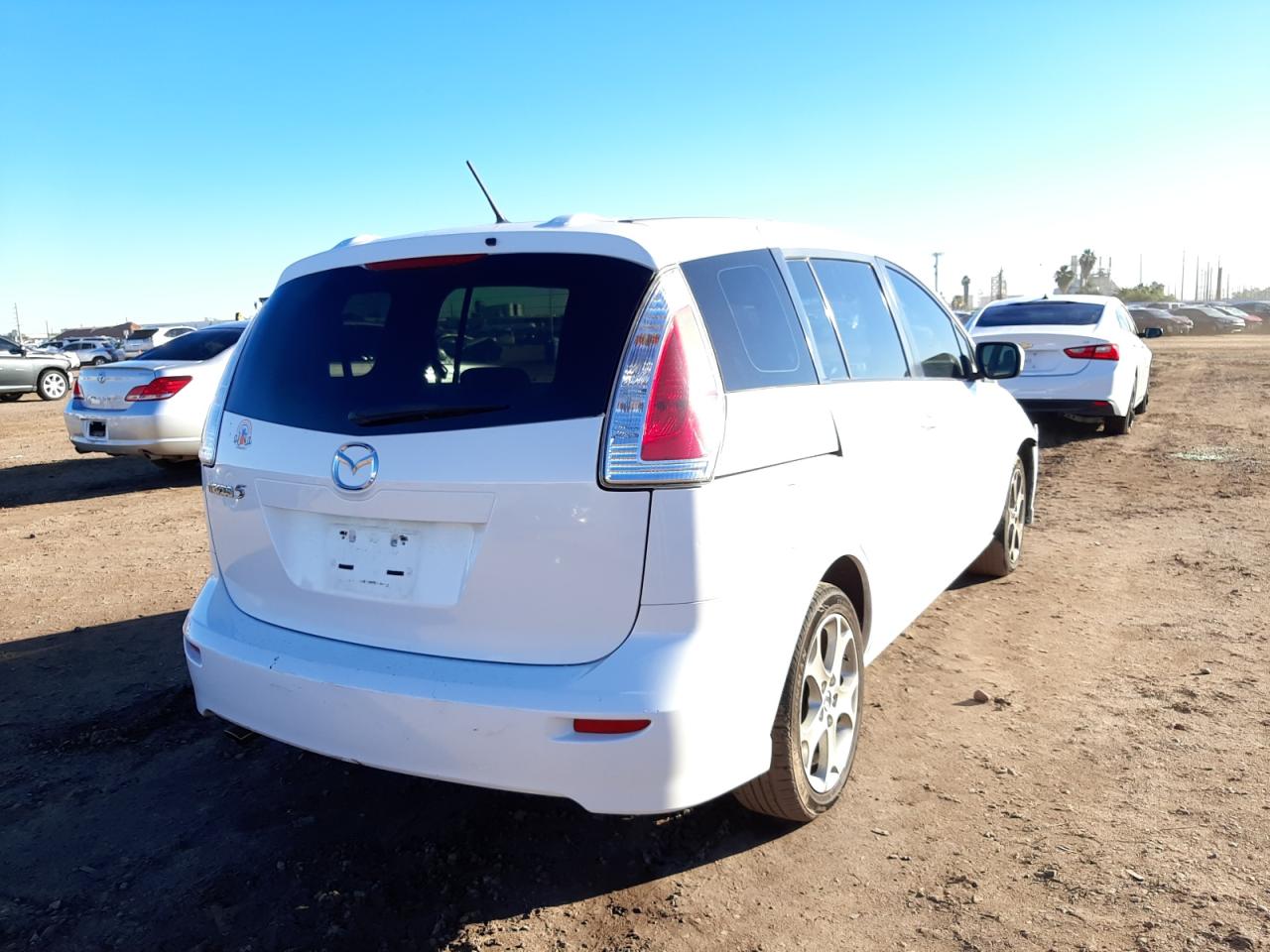 Photo 4 from auction – 2010 MAZDA 5 with VIN JM1CR2WL9A0383938