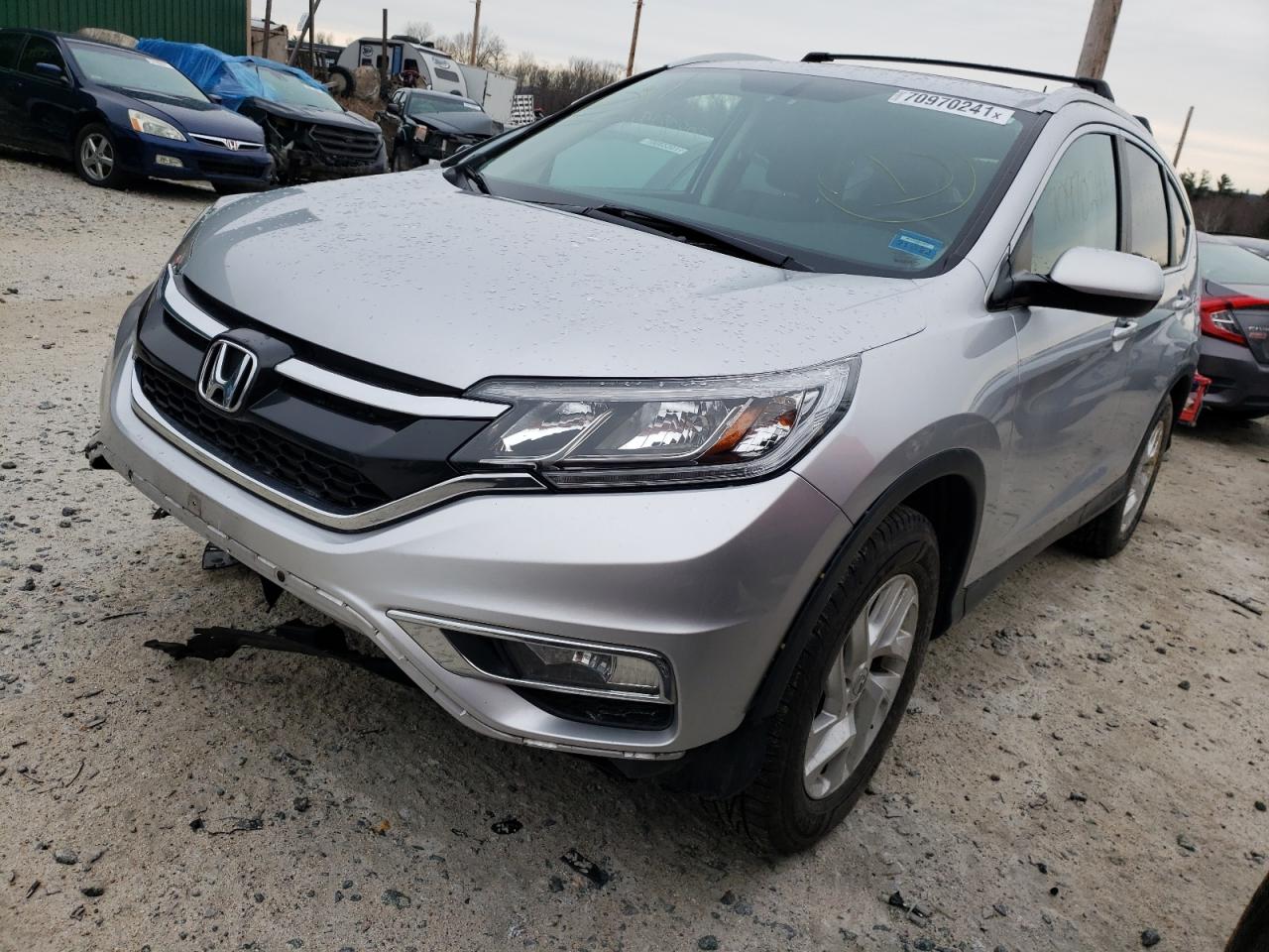 Photo 2 from auction – 2016 HONDA CR-V EXL with VIN 2HKRM4H7XGH691409