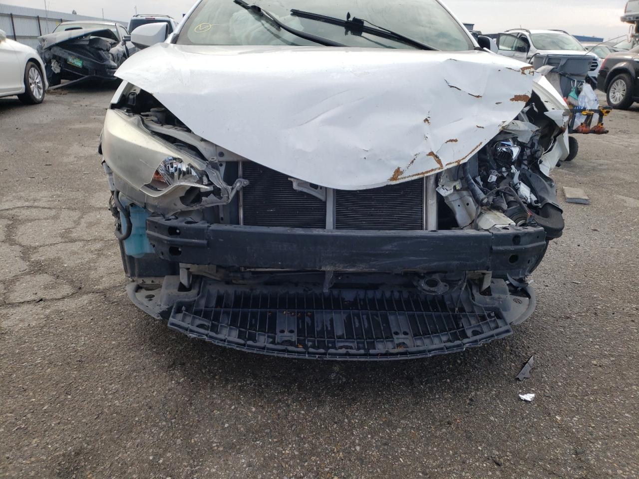 Photo 9 from auction – 2014 TOYOTA COROLLA L with VIN 5YFBURHE6EP141377