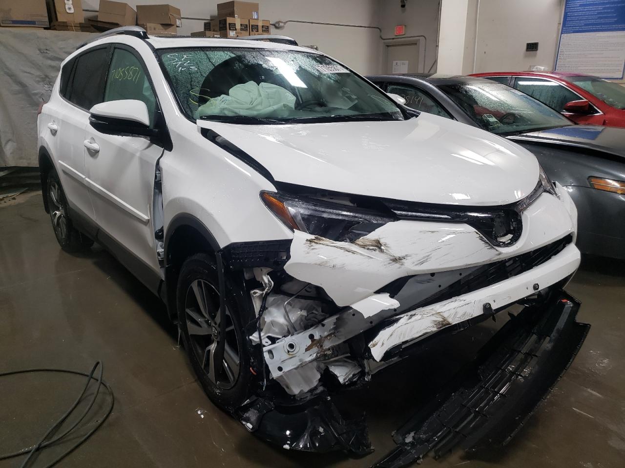 TOYOTA RAV4 XLE 2017 with VIN 2T3WFREV5HW399027 - Photo from auction