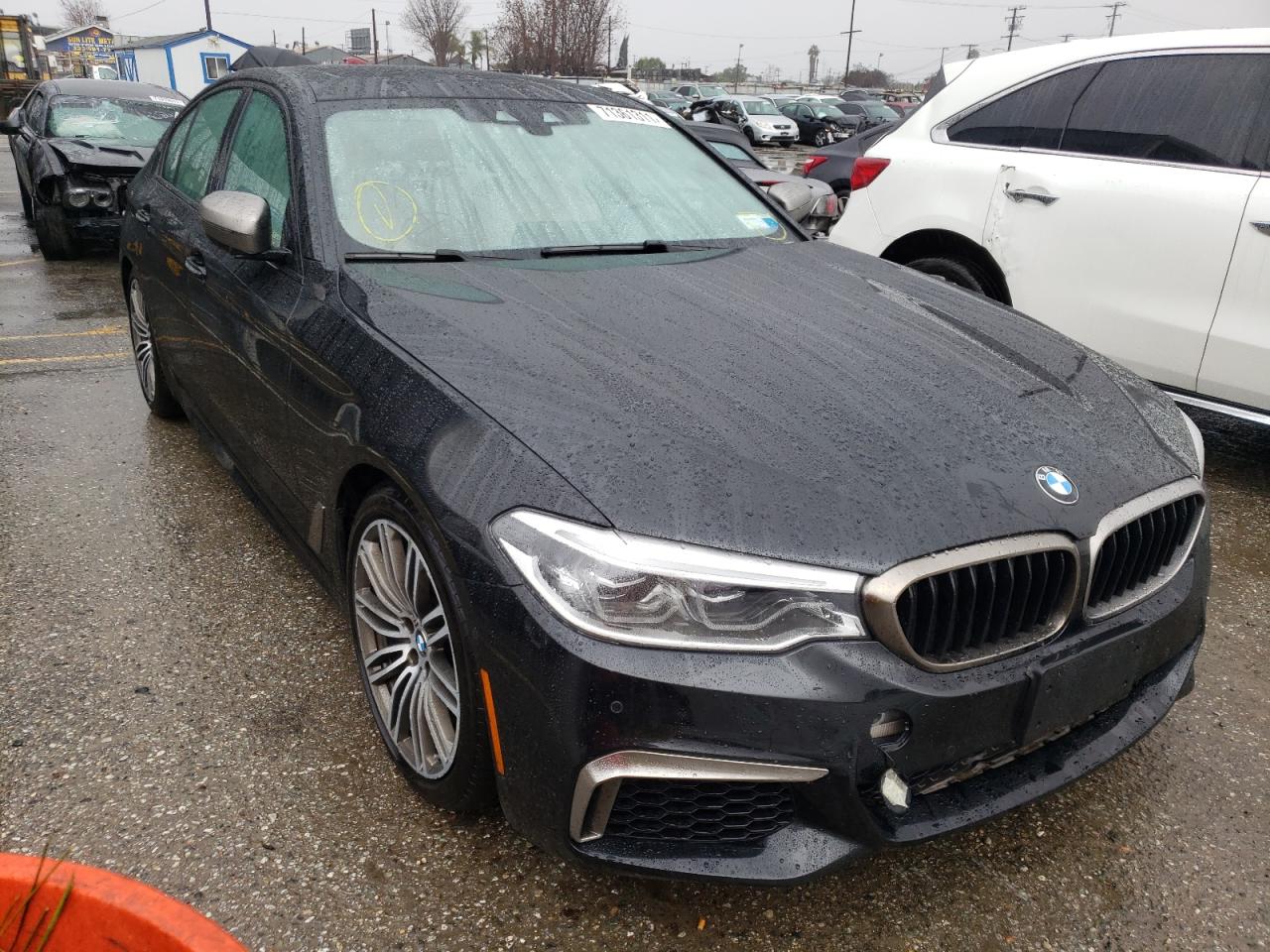 BMW M550XI 2018 with VIN WBAJB9C56JG463759 - Photo from auction