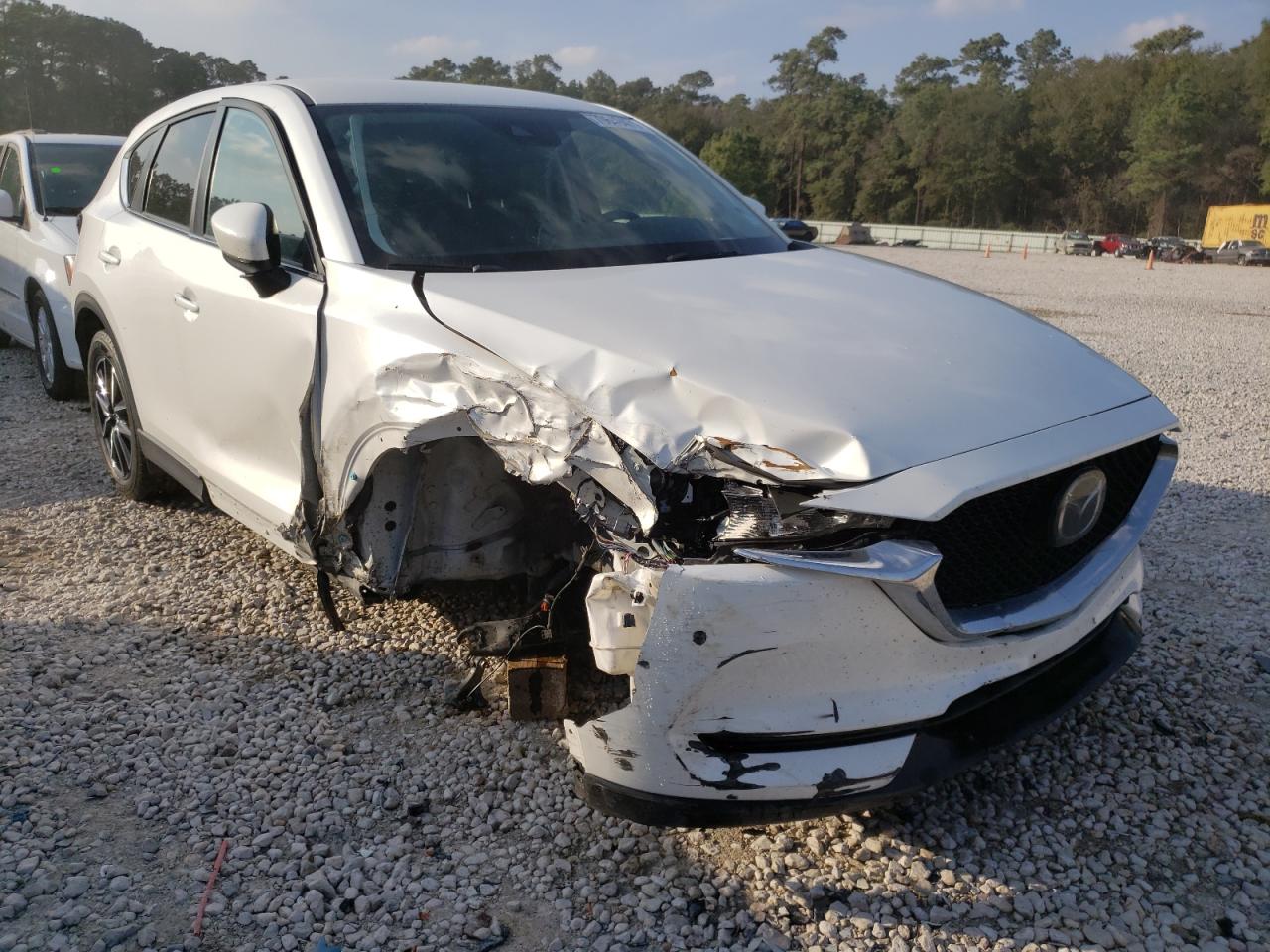 MAZDA CX-5 TOURI 2018 with VIN JM3KFACM6J0411830 - Photo from auction