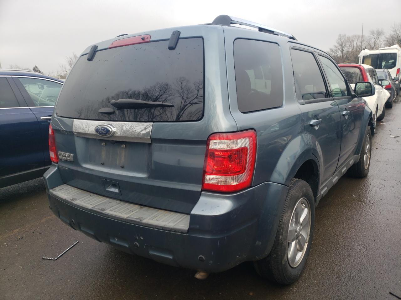 Photo 4 from auction – 2011 FORD ESCAPE LIM with VIN 1FMCU0E70BKA71810