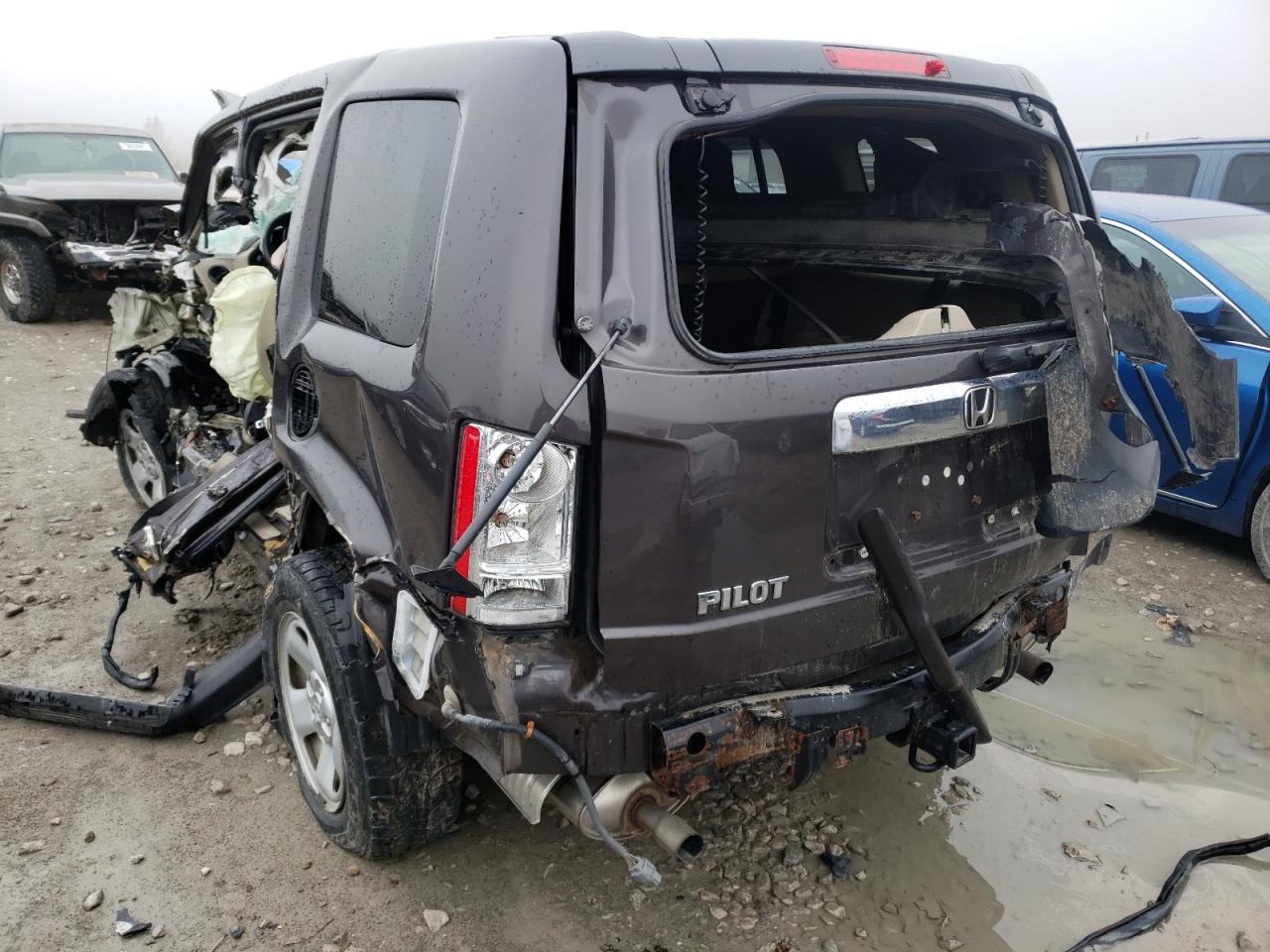 Photo 10 from auction – 2014 HONDA PILOT LX with VIN 5FNYF4H21EB037615