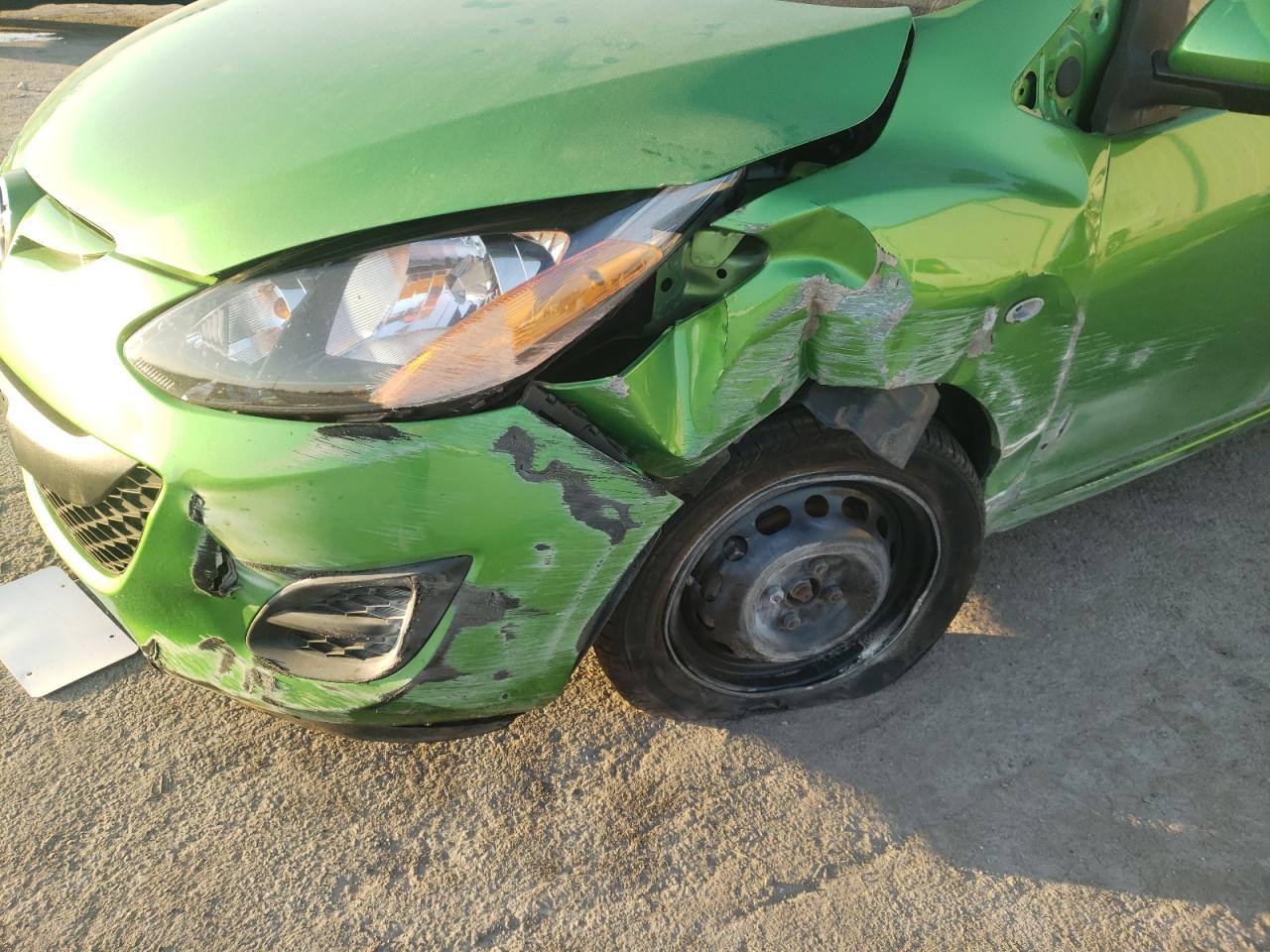 Photo 9 from auction – 2012 MAZDA MAZDA2 with VIN JM1DE1KZ5C0152199