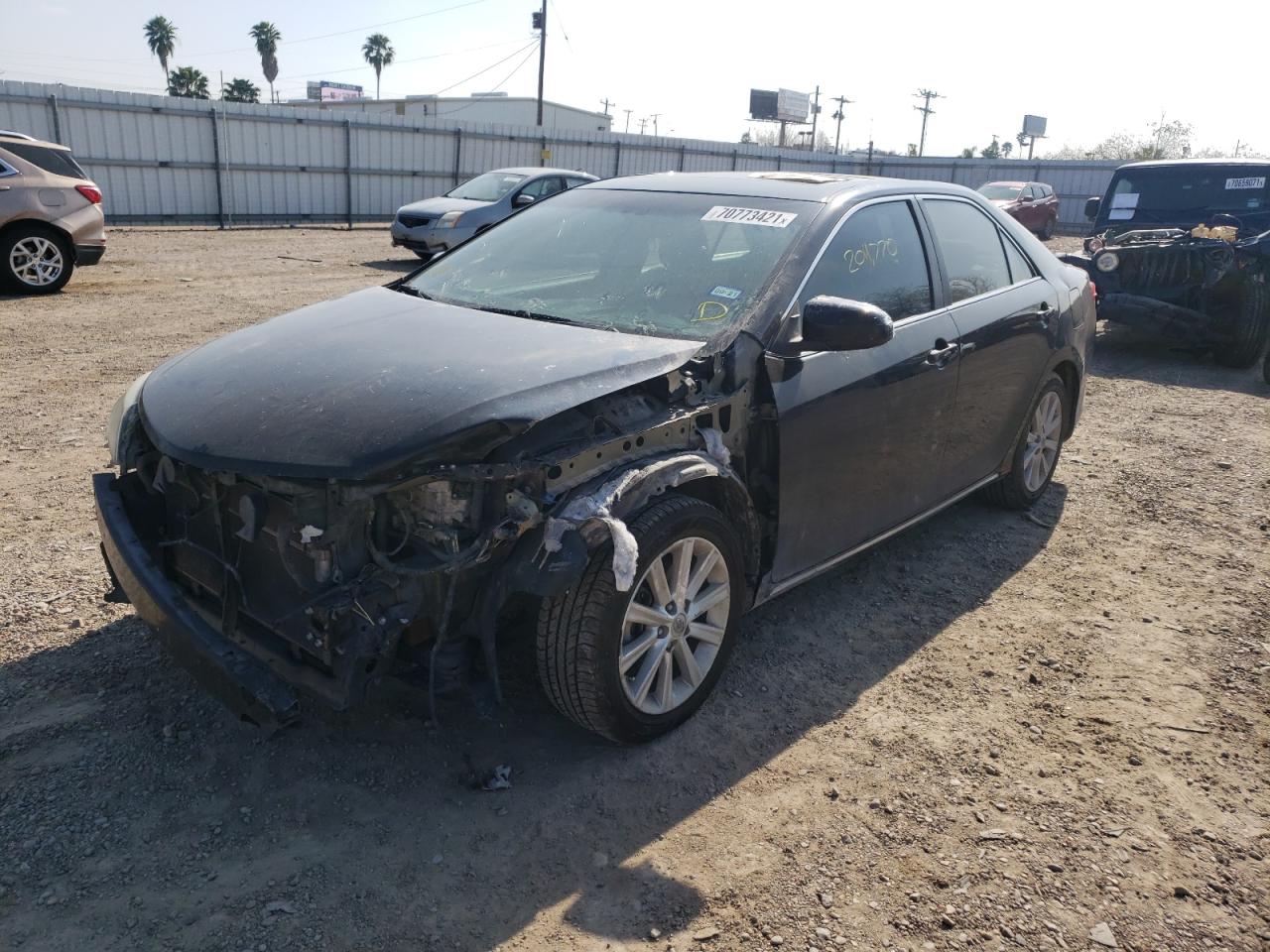 Photo 2 from auction – 2012 TOYOTA CAMRY HYBR with VIN 4T1BD1FK3CU028301