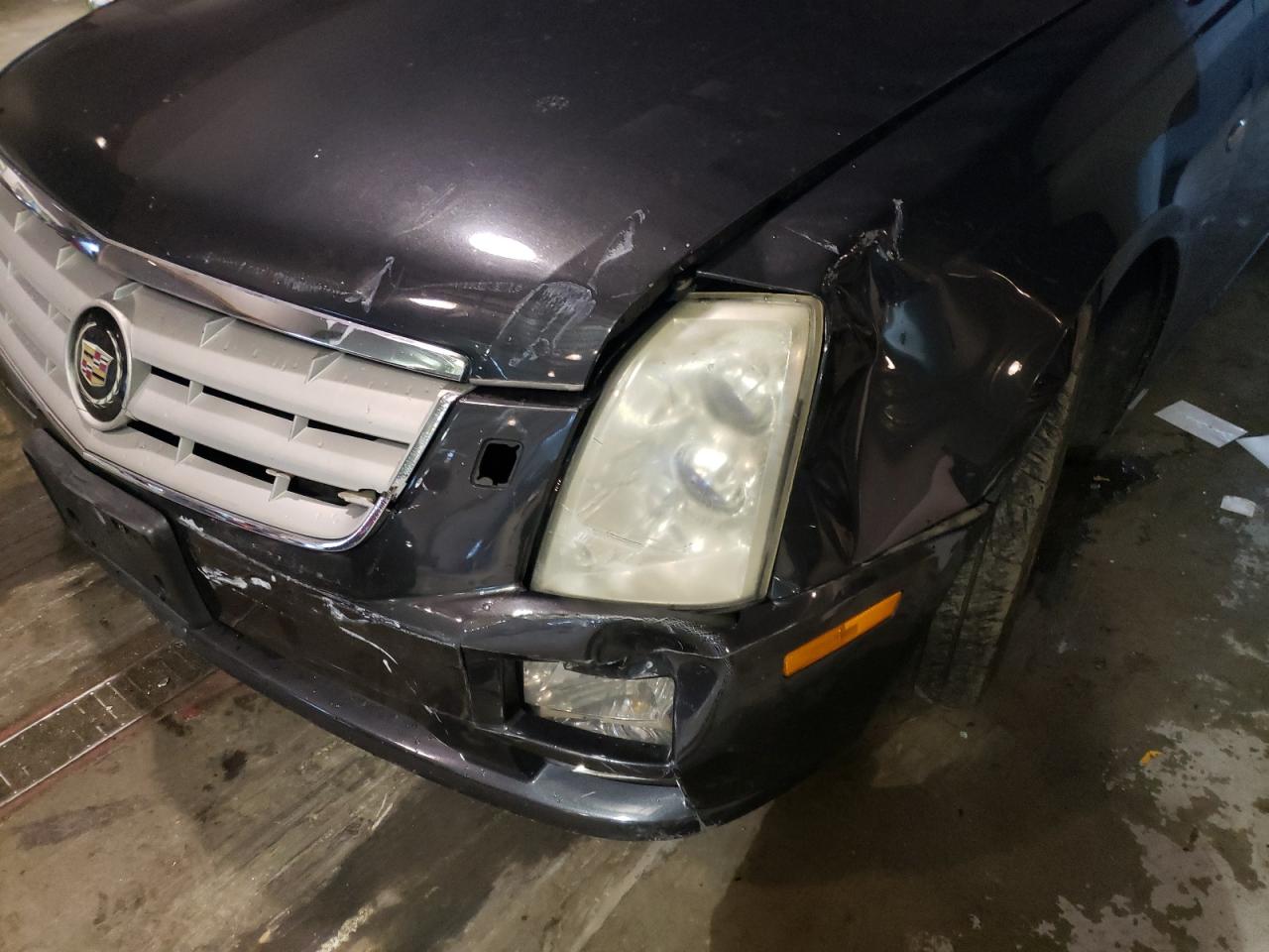 Photo 9 from auction – 2005 CADILLAC STS with VIN 1G6DC67A150211342