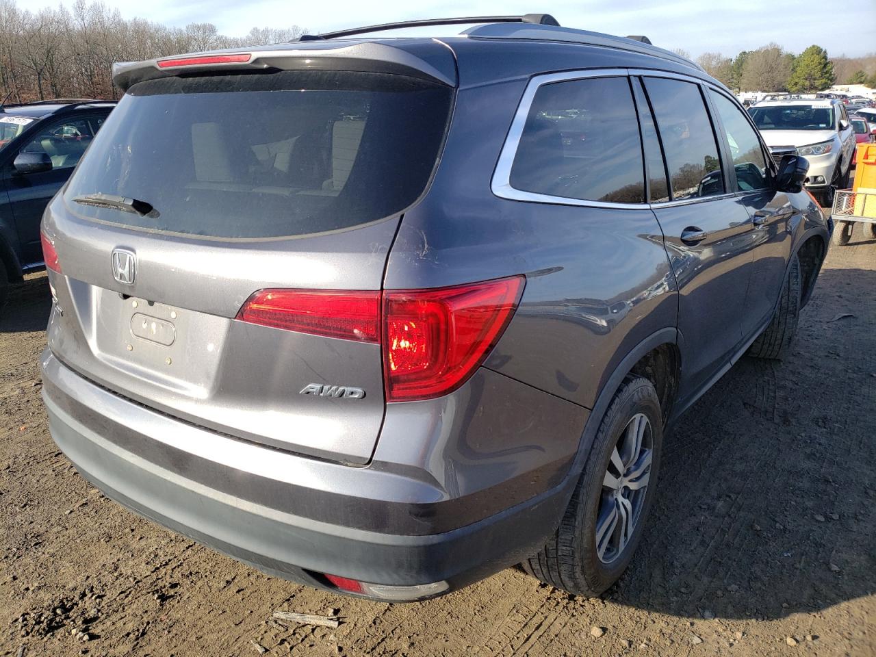 Photo 4 from auction – 2017 HONDA PILOT EXLN with VIN 5FNYF6H71HB030112