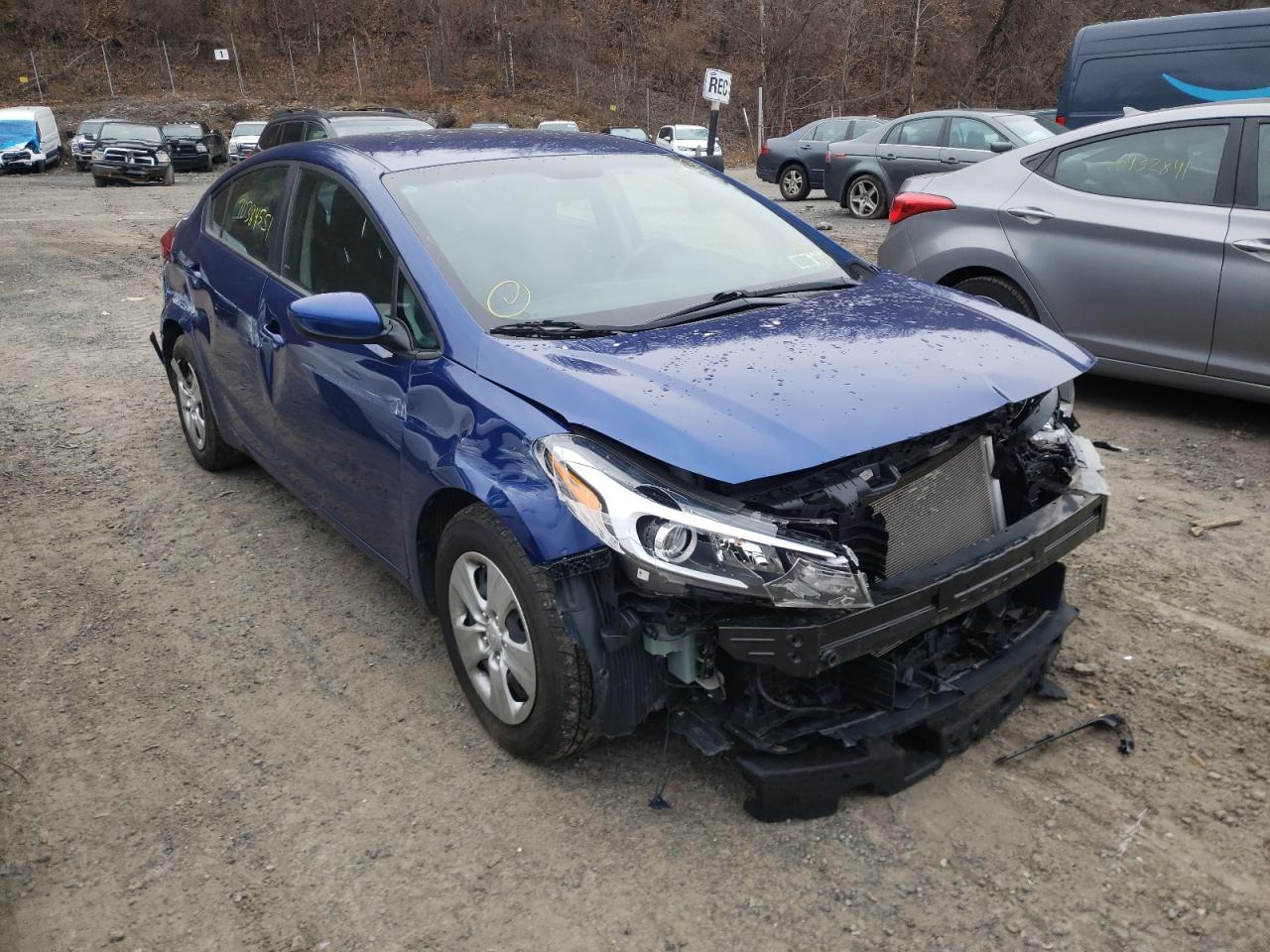 KIA FORTE LX 2018 with VIN 3KPFK4A7XJE236767 - Photo from auction