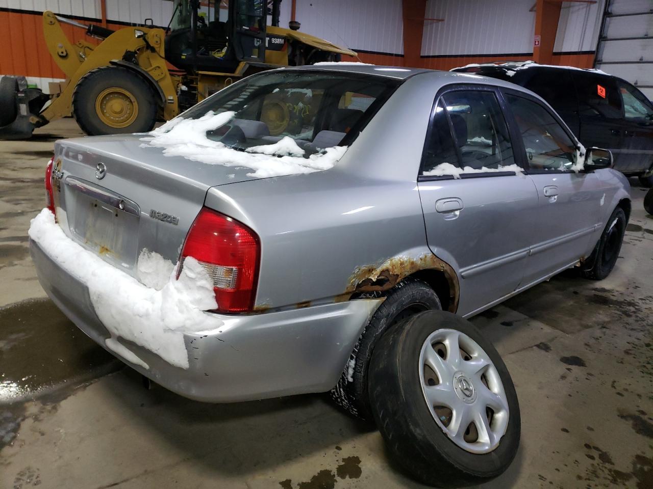 Photo 4 from auction – 2002 MAZDA PROTEGE DX with VIN JM1BJ225X21610267