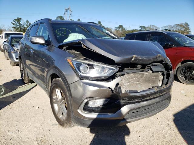 HYUNDAI SANTA FE S 2017 with VIN 5NMZU3LB9HH017367 - Photo from auction