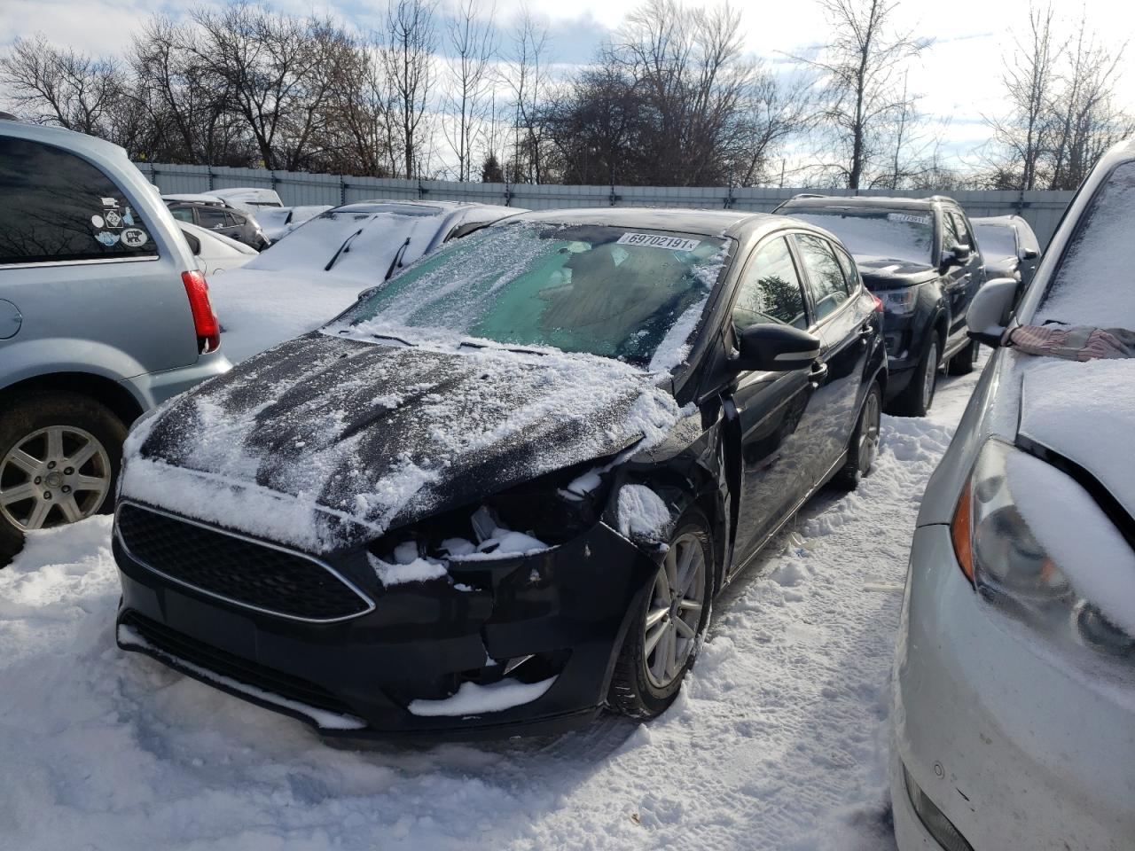 Photo 2 from auction – 2015 FORD FOCUS SE with VIN 1FADP3K23FL277011