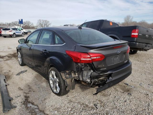 Photo 3 from auction – 2015 FORD FOCUS TITA with VIN 1FADP3J26FL299957