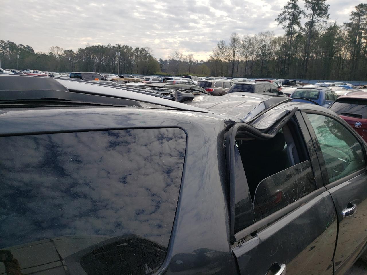 Photo 9 from auction – 2011 GMC ACADIA SLE with VIN 1GKKRNED3BJ191938