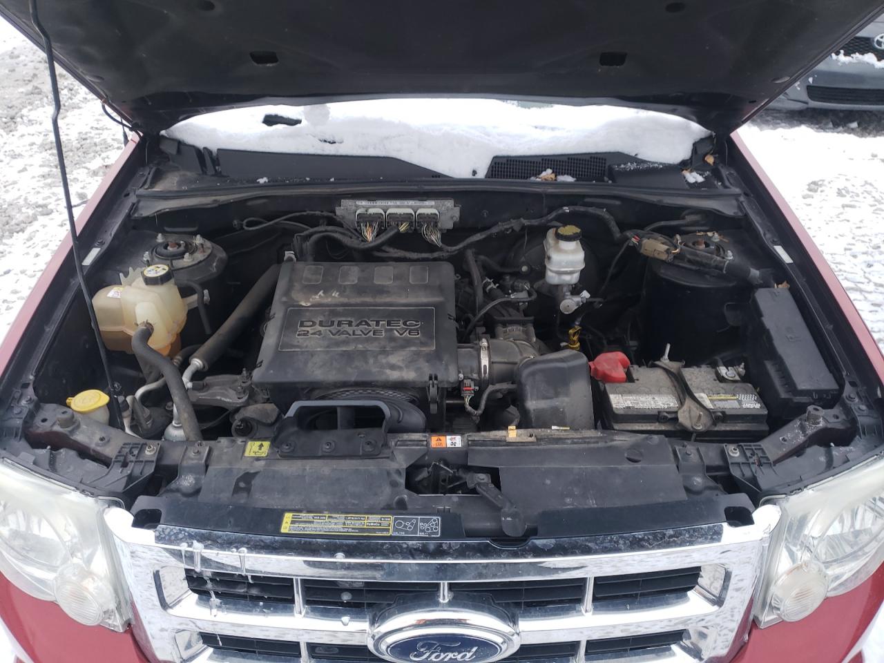 Photo 7 from auction – 2009 FORD ESCAPE LIM with VIN 1FMCU94G09KD06898