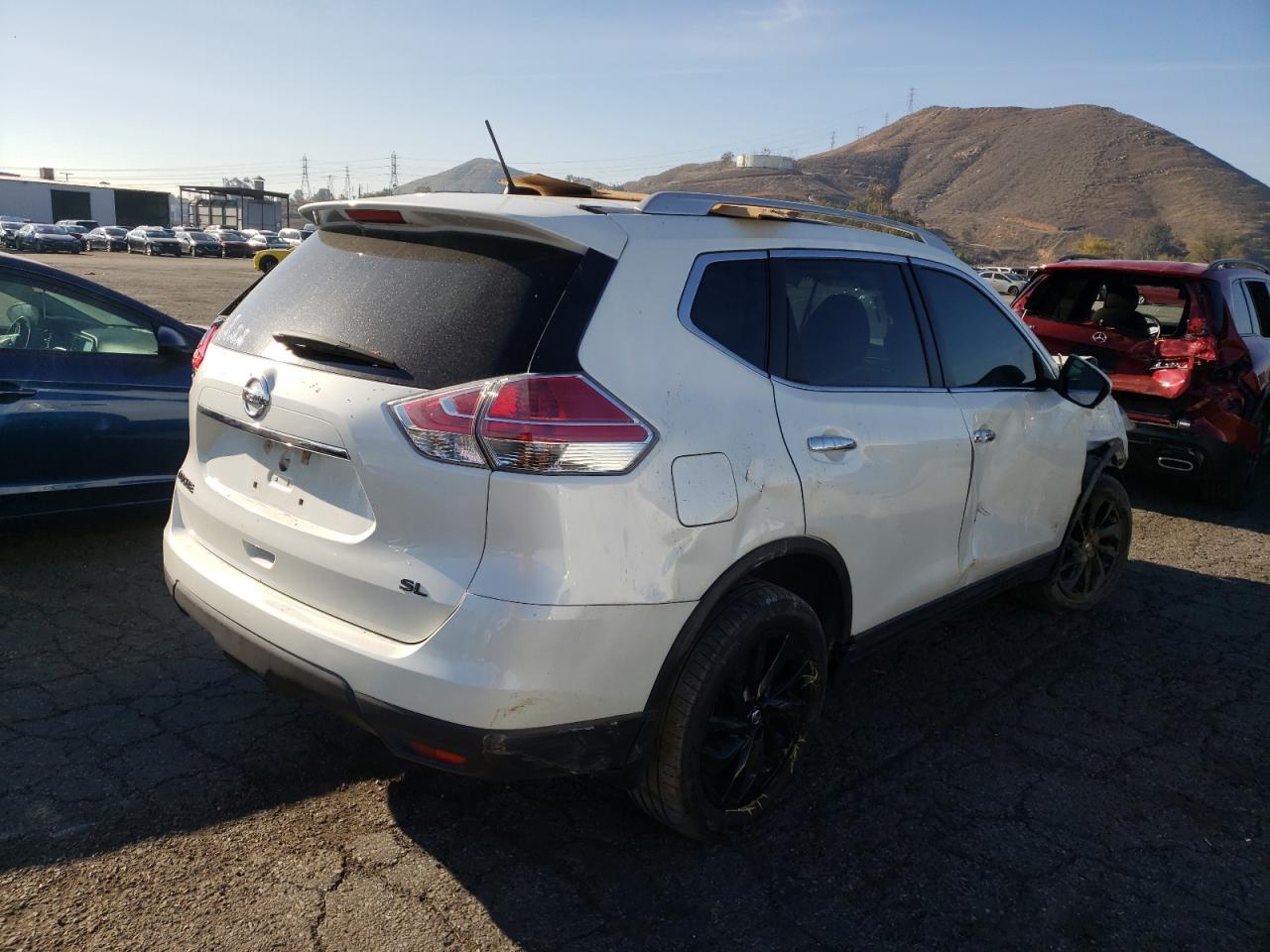 Photo 4 from auction – 2015 NISSAN ROGUE S with VIN 5N1AT2MT2FC858892