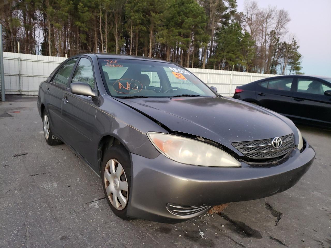 TOYOTA CAMRY LE 2002 with VIN 4T1BE32K72U575410 - Photo from auction