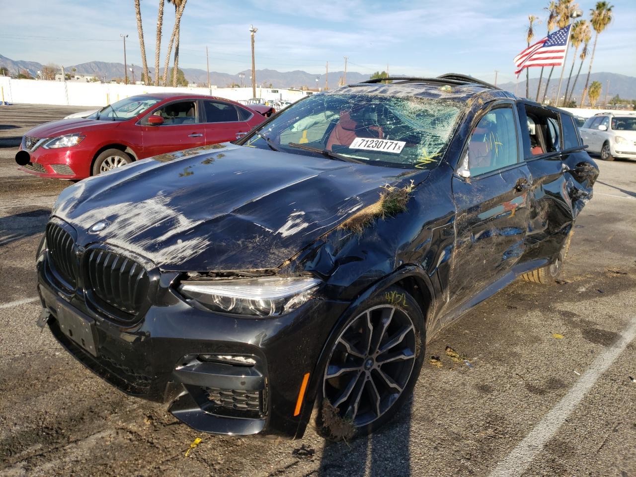 Photo 2 from auction – 2021 BMW X4 XDRIVE3 with VIN 5UX2V1C02M9F90894