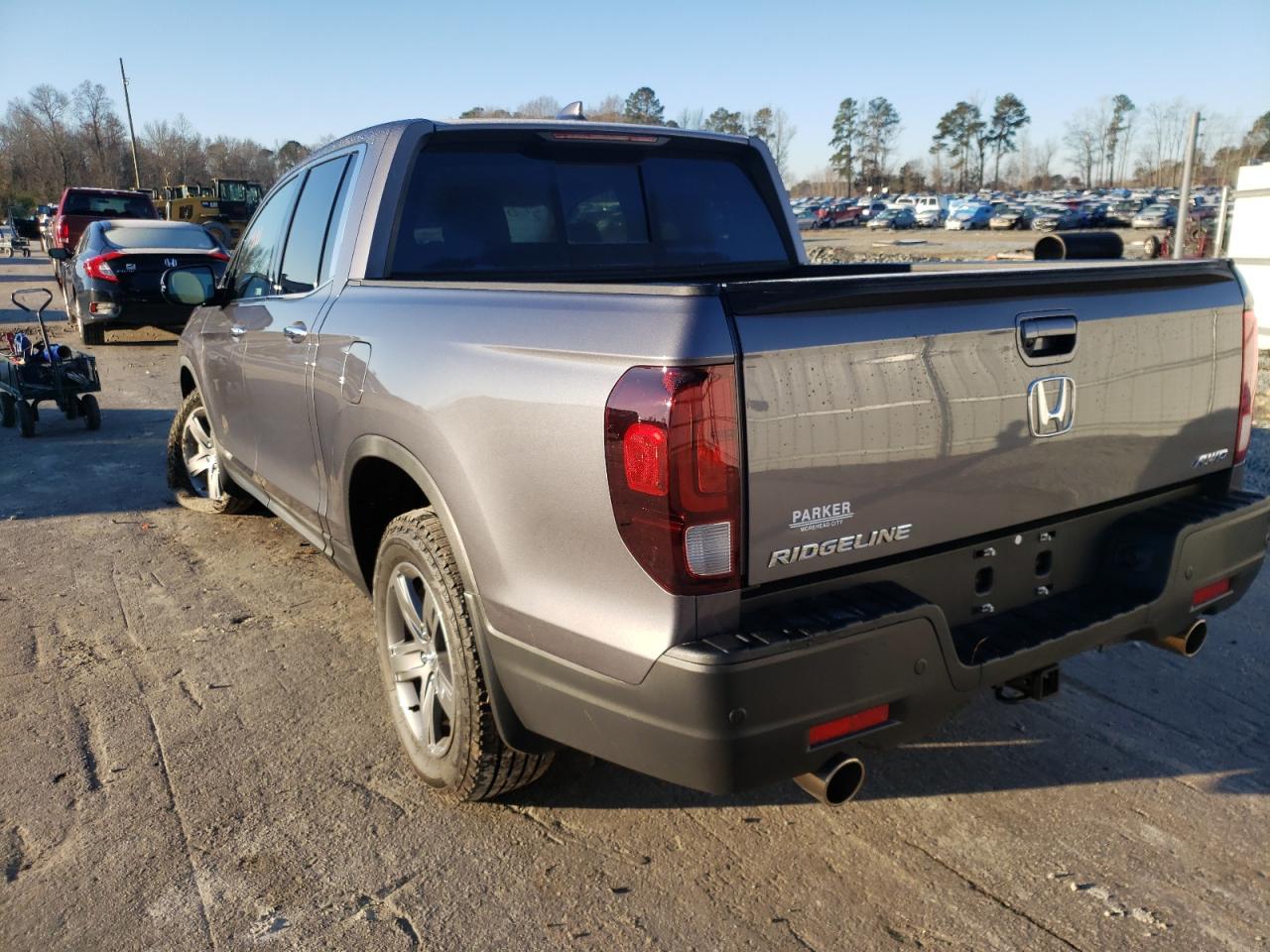 Photo 3 from auction – 2022 HONDA RIDGELINE with VIN 5FPYK3F76NB001835