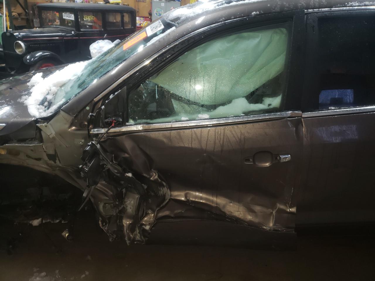 Photo 10 from auction – 2012 BUICK ENCLAVE with VIN 5GAKVCED5CJ290274