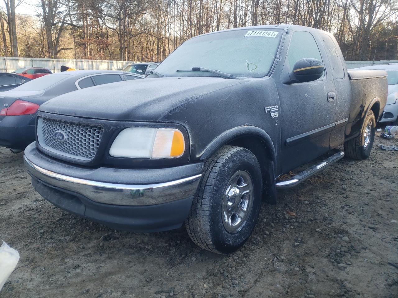 Photo 14 from auction – 2000 FORD F150 with VIN 1FTRX17W1YNA23238