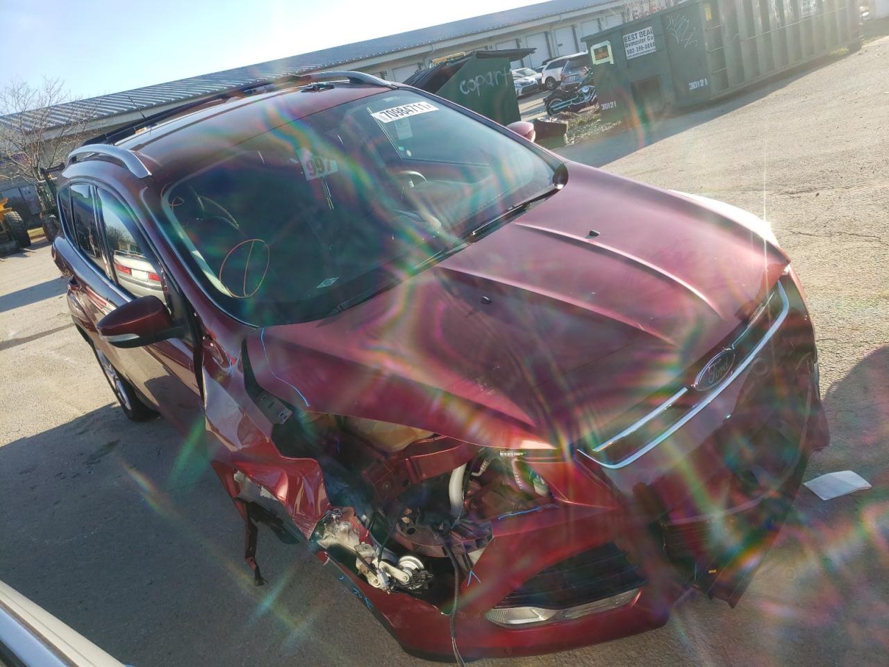 FORD ESCAPE TIT 2014 with VIN 1FMCU0J9XEUD07847 - Photo from auction
