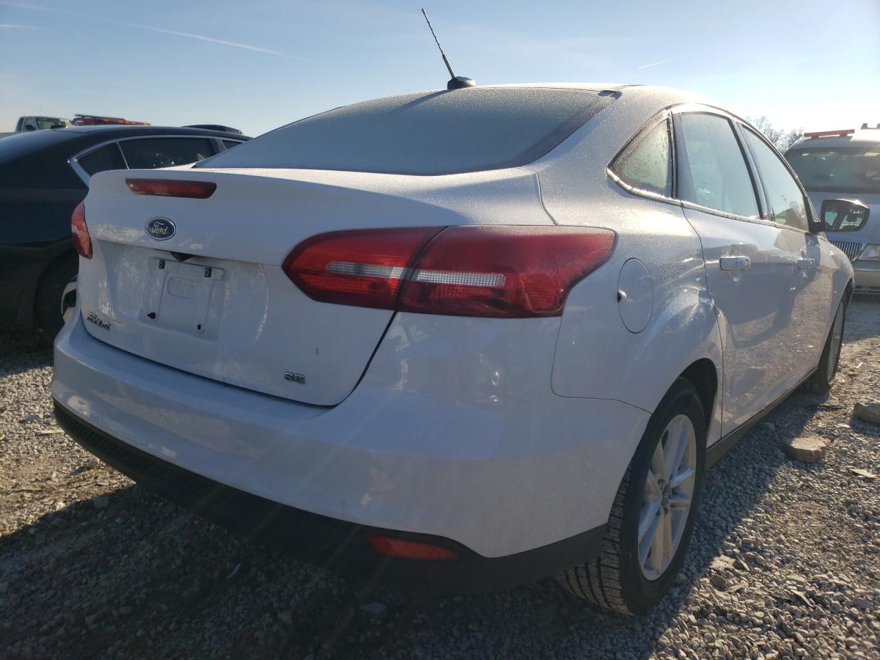 Photo 4 from auction – 2018 FORD FOCUS SE with VIN 1FADP3F21JL301583