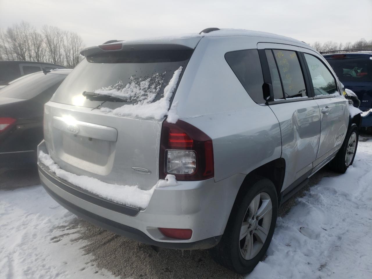 Photo 4 from auction – 2014 JEEP COMPASS LA with VIN 1C4NJCEA1ED502389