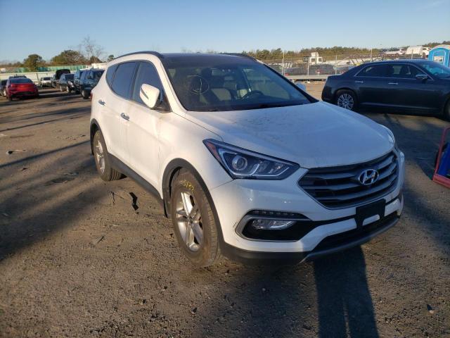 HYUNDAI SANTA FE S 2018 with VIN 5NMZU3LB6JH077645 - Photo from auction