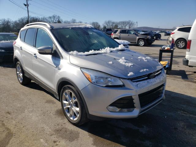 FORD ESCAPE TIT 2014 with VIN 1FMCU0J94EUC74909 - Photo from auction