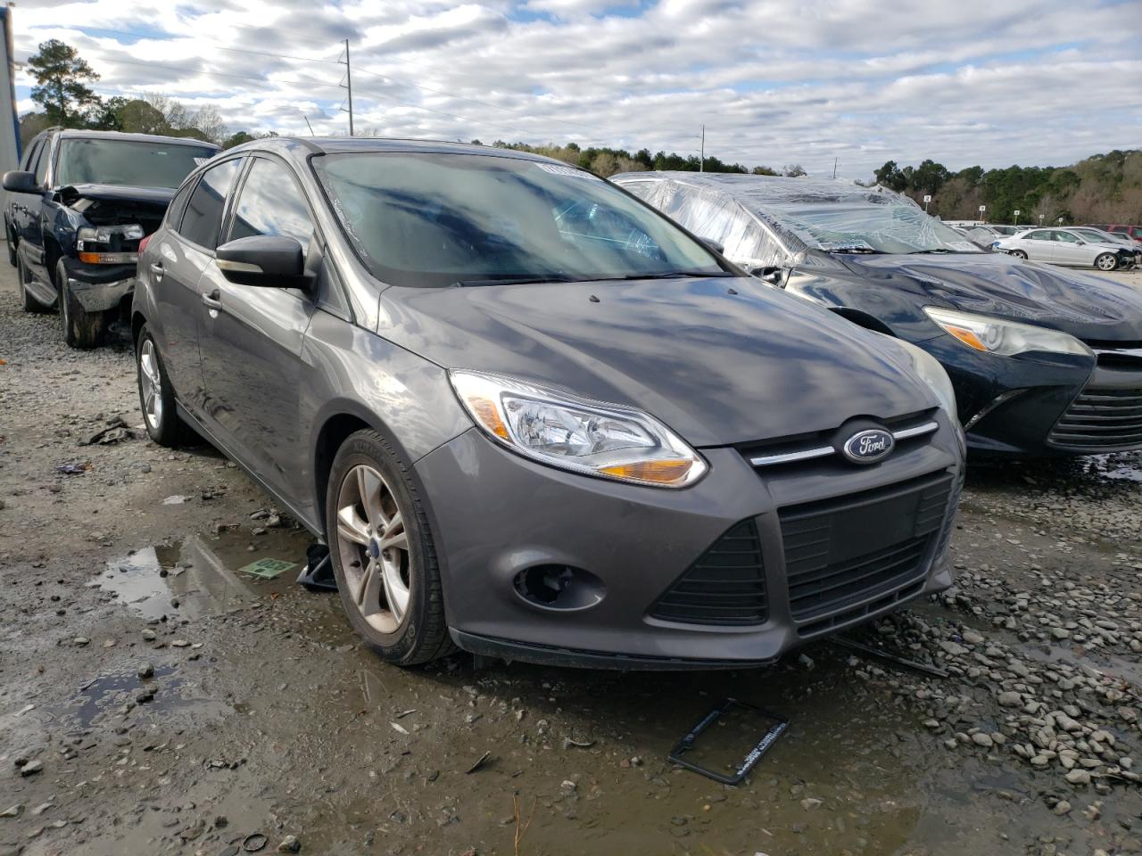 FORD FOCUS SE 2014 with VIN 1FADP3K24EL321936 - Photo from auction