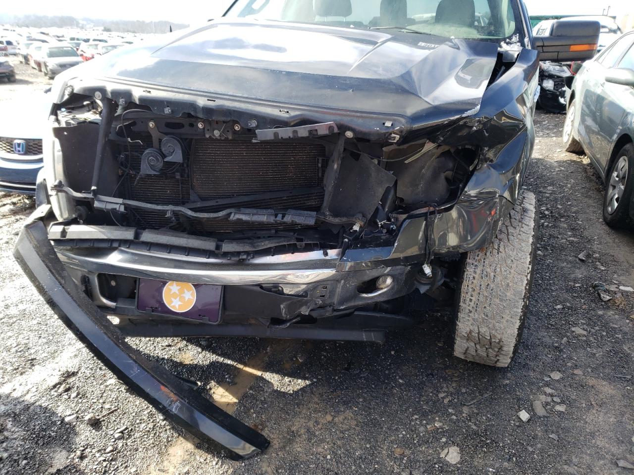 Photo 9 from auction – 2011 FORD F150 with VIN 1FTMF1EM6BFA32940