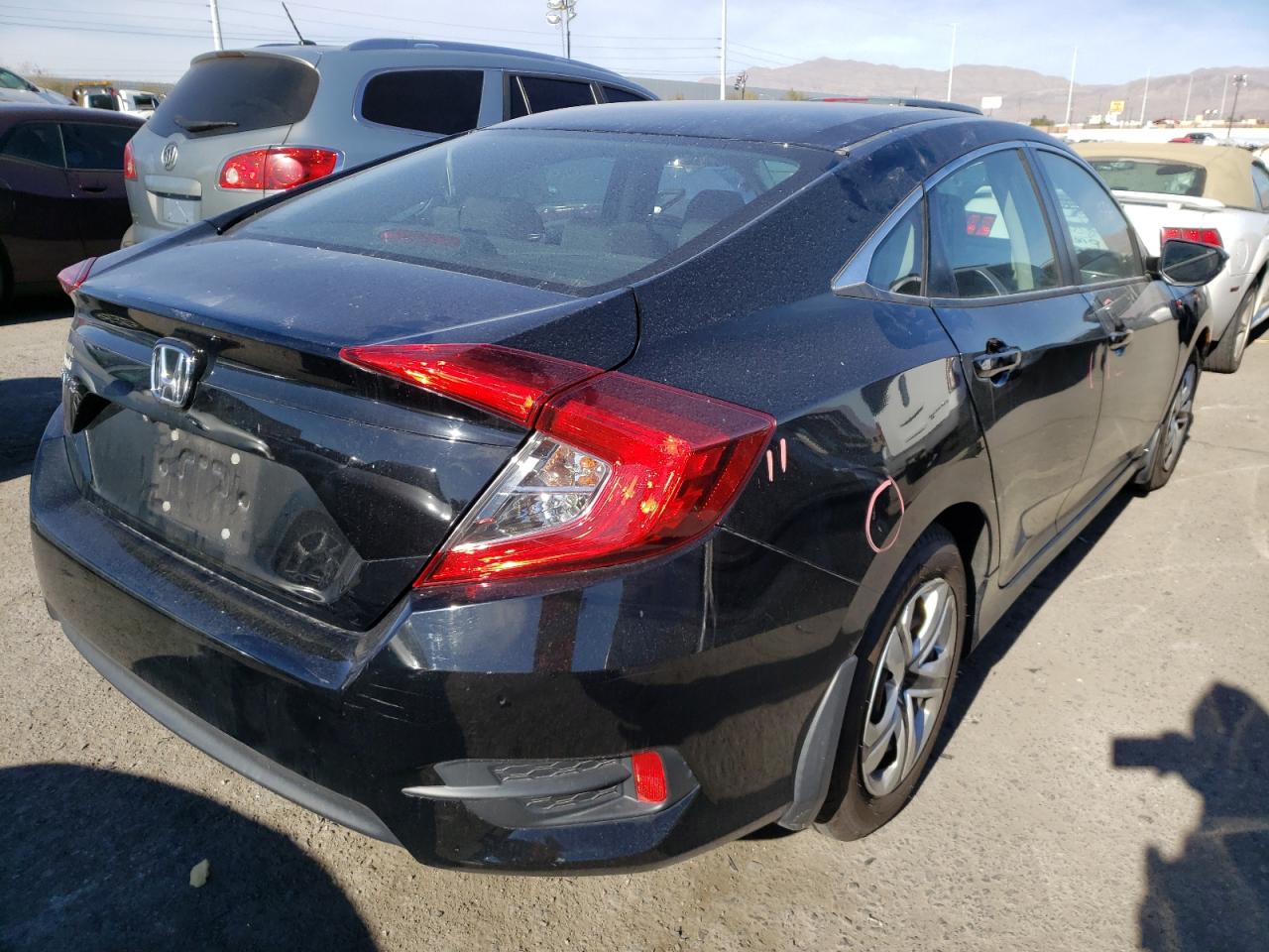 Photo 4 from auction – 2017 HONDA CIVIC LX with VIN 19XFC2F54HE057188