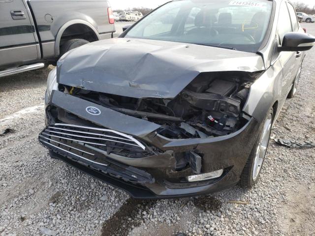 Photo 9 from auction – 2015 FORD FOCUS TITA with VIN 1FADP3J26FL299957