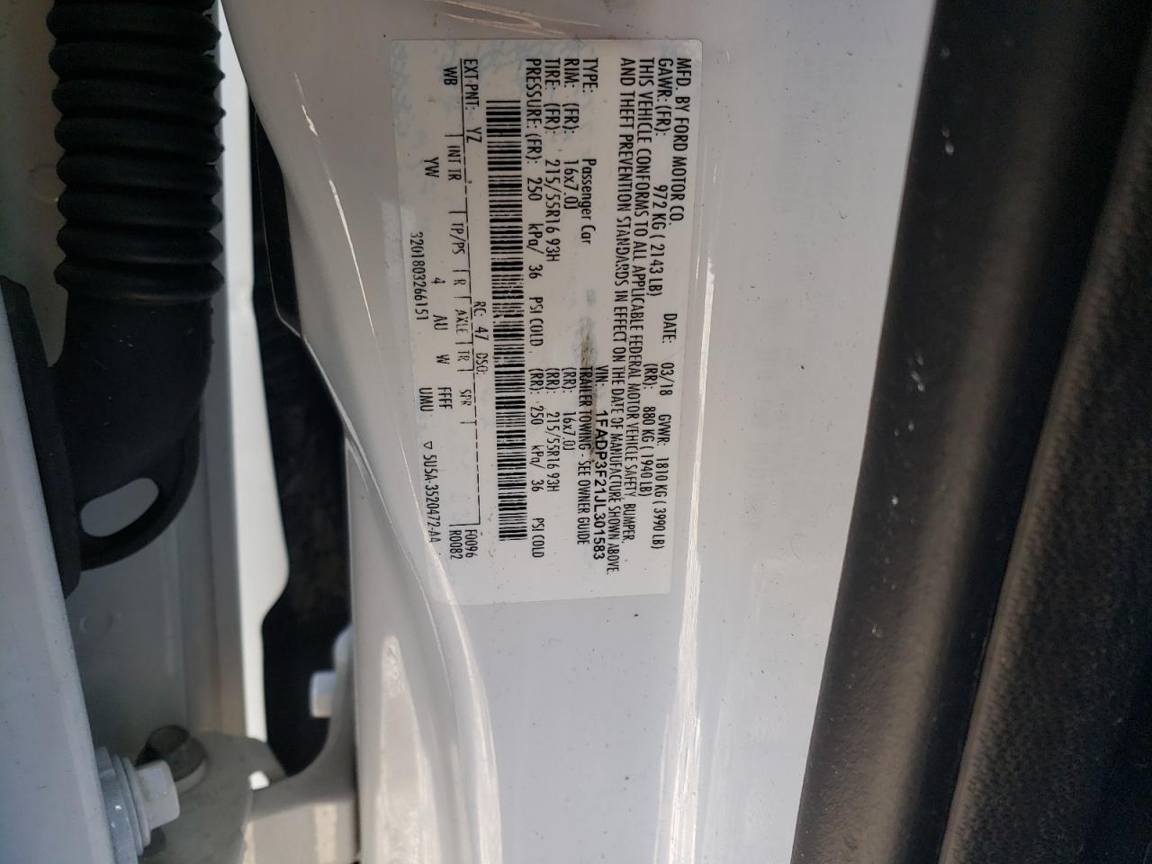 Photo 10 from auction – 2018 FORD FOCUS SE with VIN 1FADP3F21JL301583