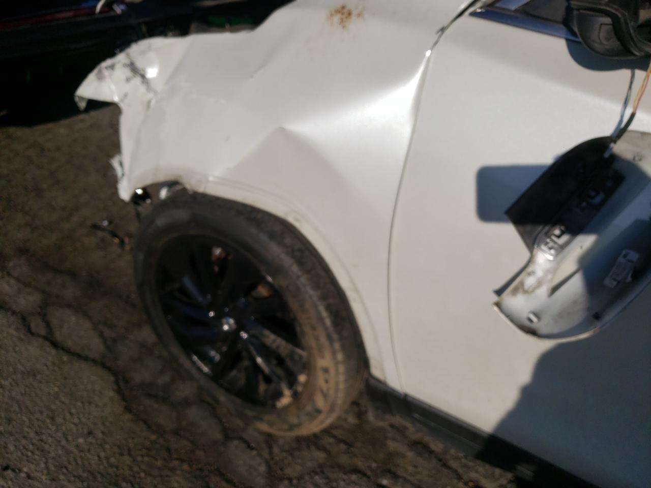 Photo 9 from auction – 2015 NISSAN ROGUE S with VIN 5N1AT2MT2FC858892