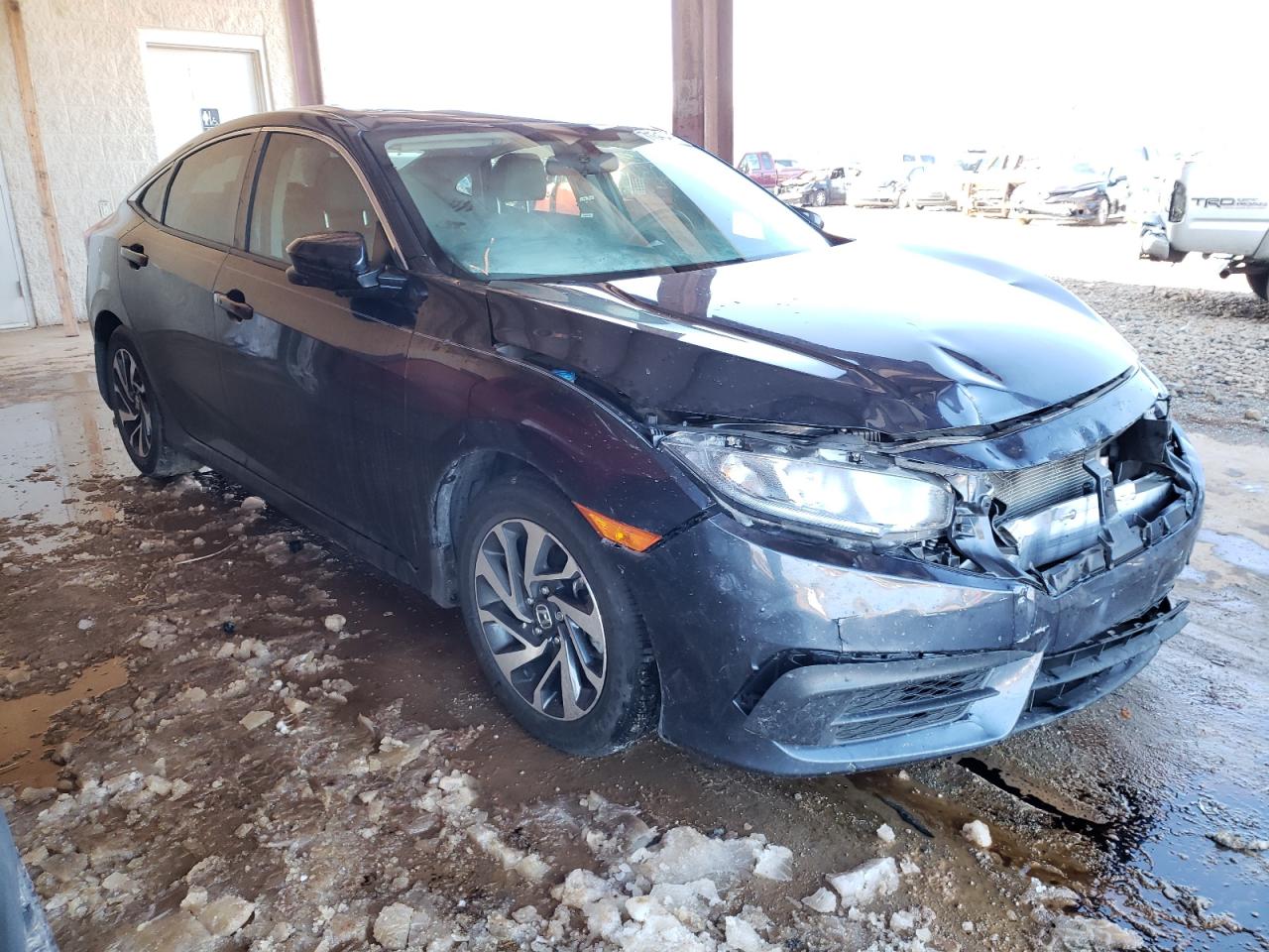 HONDA CIVIC EX 2018 with VIN 2HGFC2F72JH609638 - Photo from auction