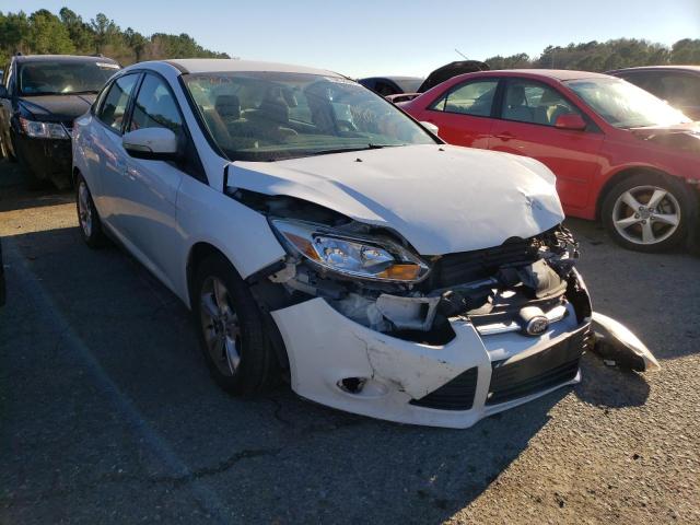 FORD FOCUS SE 2014 with VIN 1FADP3F20EL281204 - Photo from auction