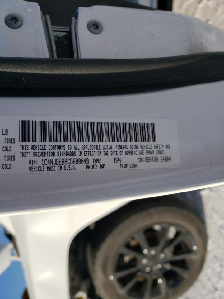 Photo 10 from auction – 2012 JEEP COMPASS LA with VIN 1C4NJDEB8CD698049